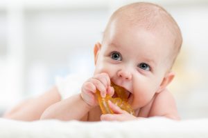 Find out all you need to know about helping a teething baby during their sleep and awake times.